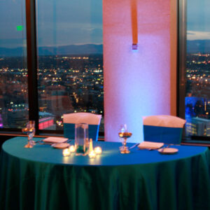 A table with a view of the city.