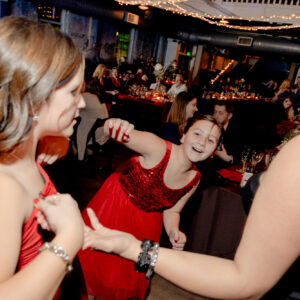 A woman wearing a red dress.