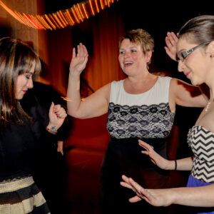 A woman wearing a black dress.