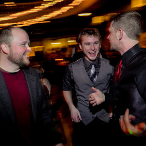 A group of men at a party.