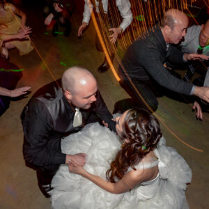 A bride and groom dancing on the dance floor, accompanied by the Georgia wedding DJ's tunes.