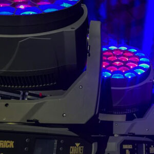 A group of moving lights on a Georgia wedding DJ's stage.