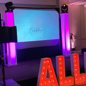 A stage with the word "all" in front of it, perfect for bar mitzvahs and bat mitzvahs.
