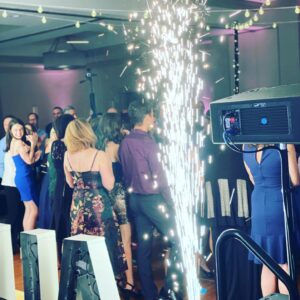 A group of people at a georgia wedding with sparklers.