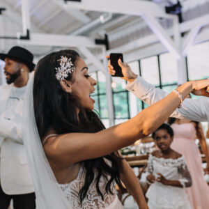 A bride and groom dancing at their wedding reception.