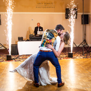 The newlyweds sharing their first dance as a married couple, surrounded by the enchanting glow of sparklers.
