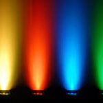 A row of colored lights in a dark room, illuminating the setting for a Georgia corporate DJ service.
