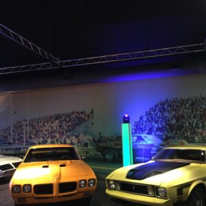 A display of cars on display in a museum.