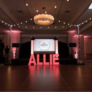 A dance floor with the word allie on it.