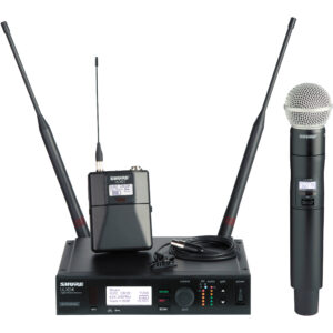 DJ equipment with a Samson wireless microphone system including two microphones.