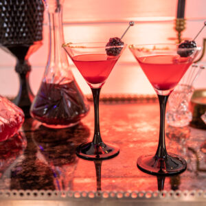 Two glasses of red wine on a table at a Georgia wedding.
