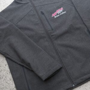 A gray jacket with a pink georgia corporate dj logo on it.