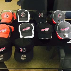 A group of hats on a table at a Georgia wedding.