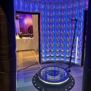 A room with a blue light in the middle of it, perfect for a Georgia wedding DJ.