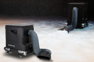 A black DJ service machine with a hose on top of it.